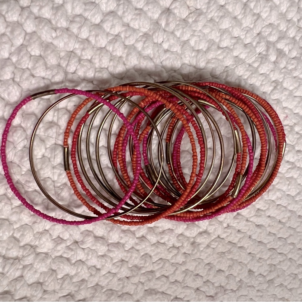 Gold, orange and pink bangles